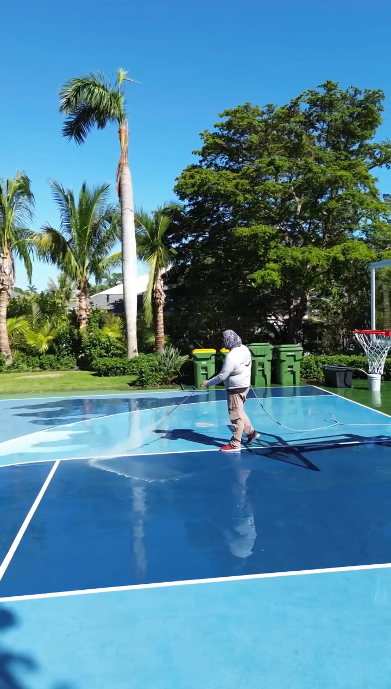 Private sport court restored by pressure washing
